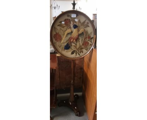 Victorian rosewood pole/makeup screen having tapestry panel of an exotic bird amongst foliage on a triform base. (B.P. 21% + 