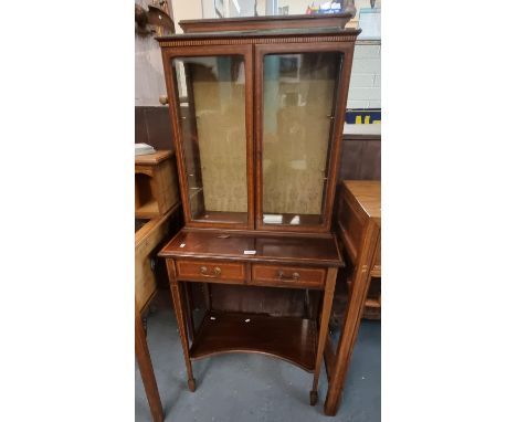 Edwardian mahogany inlaid cabinet back two door glazed cabinet with glass slides, projecting base above two fitted drawers, s