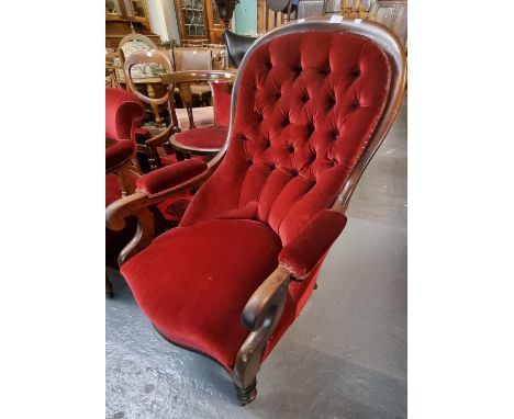Victorian walnut upholstered button back show frame fireside armchair.  (B.P. 21% + VAT) 