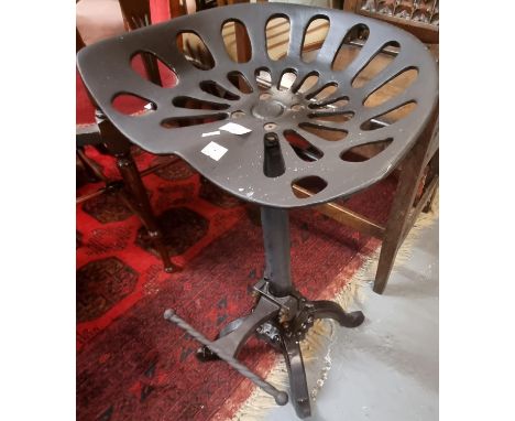 Reproduction cast iron tractor stool. (B.P. 21% + VAT) 