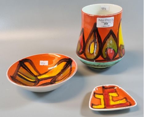 Three 1970s Poole Pottery orange ground and abstract items, to include: delphis pin dish, bowl and vase. (3) (B.P. 21% + VAT)