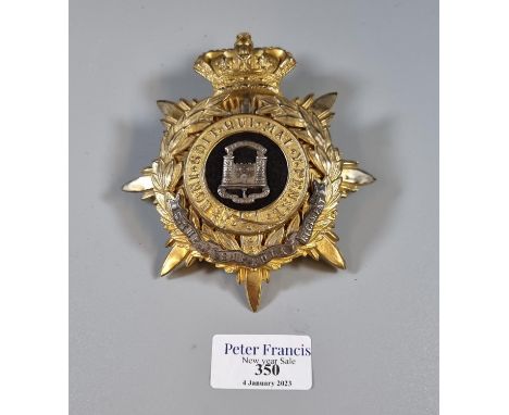 The Suffolk Regiment (QVC) gilt metal helmet plate.  Early 20th century.  (B.P. 21% + VAT) 