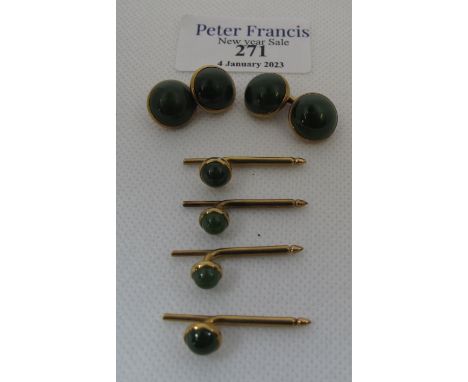 A Pair of jade cufflinks set in 14ct gold together with four matching dress buttons. (B.P. 21% + VAT) No obvious damage. No n