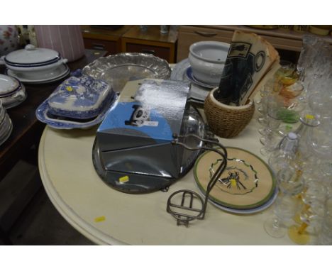 A blue and white willow patterned tureen and cover; together with matching meat plate, a circular metal dish, an oval wall mi