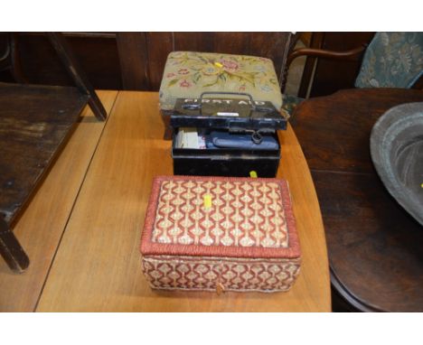 A First Aid tin; a small upholstered stool; and a sewing basket 
