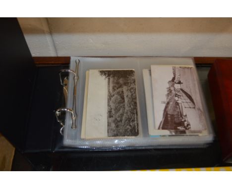 An album of approximately 100 vintage Norfolk related postcards 