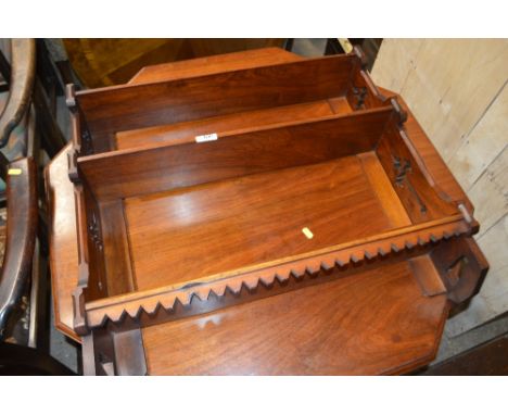 A late Victorian Gothic style three tier wall shelf 