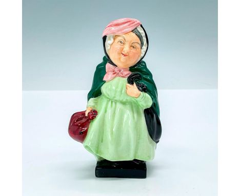 Charming figurine of grandma figure with light green dress and green cloak. Royal Doulton backstamp. Artist: Leslie Harradine