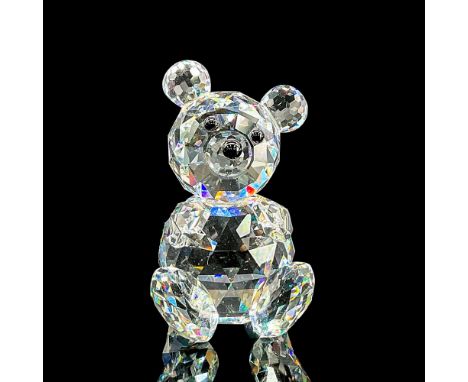 Dazzling cut crystal figure of a sitting bear with black eyes and nose. Swarovski mark. Item number 7637NR54. Retired. This i