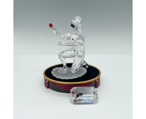 Harlequin was the final piece of the Masquerade trilogy. He is made from clear, frosted and black crystal, and holds a red cr