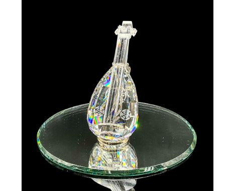 Clear faceted crystal figure of a lute with Celtic style etched design. Retired. Swarovski mark. Item number 7477NR000004. Pa