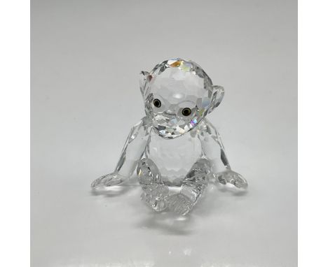 Part of the African Wildlife group this cute figural has arms to his side looking out with his topaz crystal eyes. Swarovski 