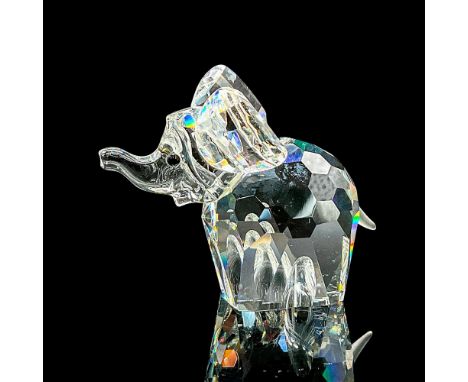 Clear faceted crystal figure of an elephant with black eyes and frosted tail. Item number 7640NR060000. Retired; part of the 