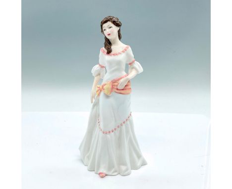 A glossy figure of a woman in a white dress with a pink-yellow sash bow. Royal Doulton backstamp. Artist: Nada PedleyIssued: 