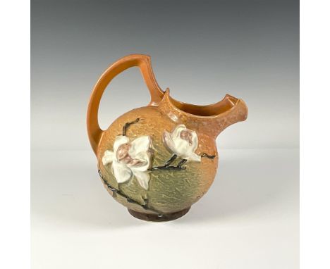 Handled pitcher including raised mark Roseville USA. Matte finish. Issued: 20th centuryDimensions: 9"L x 7.5"W x 9"HManufactu