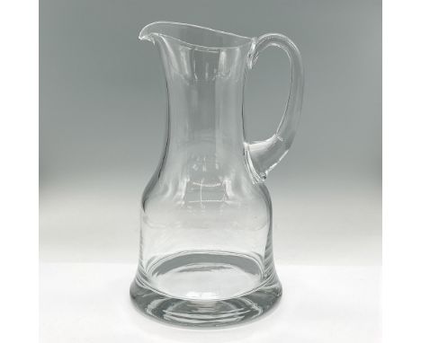 Large lovely clear glass serving pitcher. Dimensions: 7"L x 6.25"W x 11"HCondition: Age related wear.
