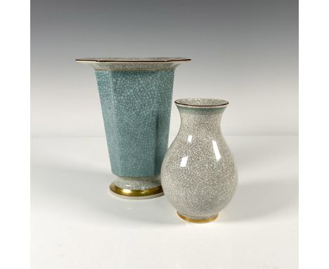 A pair of vases both crazing under glaze, with a gold gilt rim and bands throughout vase. Body of taller vase has light blue 