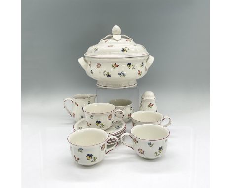 Twelve piece serving set for tea or coffee in white porcelain with happy colorful floral pattern. Covered serving dish 9.25"L