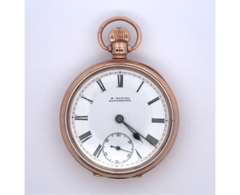 An H. Samuel 9ct gold pocket watch. White enamel dial. inscribed H. Samuel Manchester with sub seconds dial. Inner case with 