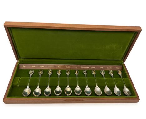 'The Royal Horticultural Society Flower Spoons', a set of twelve silver spoons each featuring a different 24ct gold plated fl