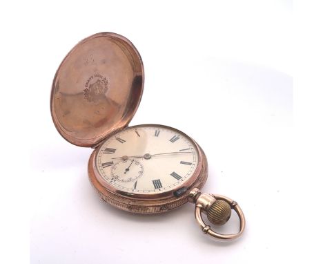 A full hunter pocket watch stamped K9 (9ct gold). White enamel dial with sub seconds dial and Roman numeral hour markers. Fro