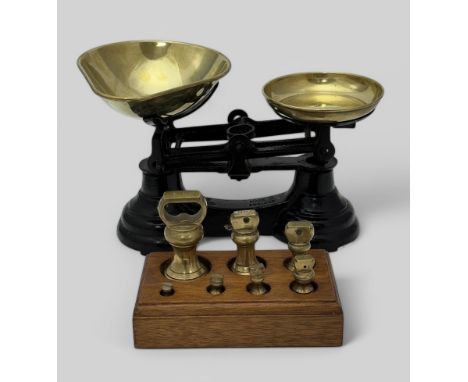 A set of Librasco kitchen scales and brass bell weights