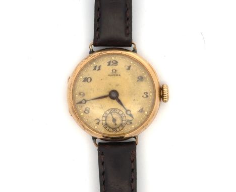 A vintage 18ct Omega watch on dark brown leather strap. Case numbered 6501604, movement numbered 7024976. Case diameter 26mm.