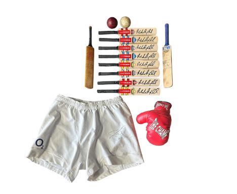 Signed Sporting Memorabilia. Including a signed Ricky Hatton Boxing Glove. Match Worn Rugby shorts signed by Steve Thompson. 