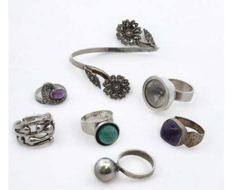 A Scandinavian jewellery including six silver rings, and a marcasite set silver bangle.&nbsp;Sizes K to M.