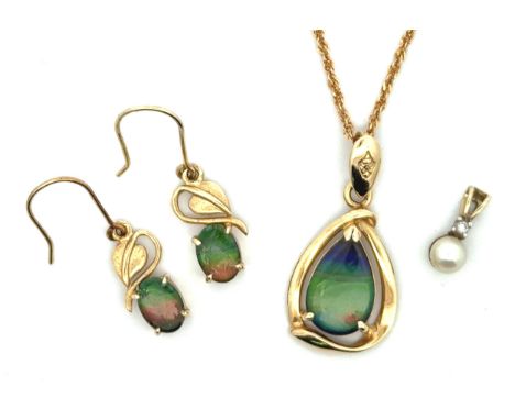 A pair of imitation opal earrings stamped 14ct, with a matching pendant stamped 14ct, on a chain stamped 750. And a small 9ct
