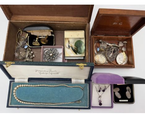A small collection of silver and costume jewellery. Inclding a silver St Christopher pendant, a silver foliate engraved locke