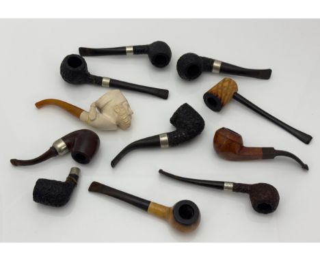 A collection of 8 Peterson and 3 Meerschaum estate pipes. Peterson Donegal Rocky 407 with silver mount, K&amp;P Peterson's st
