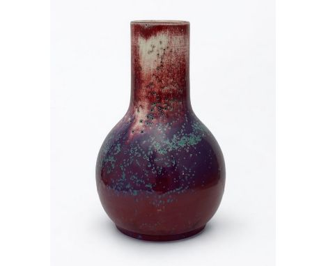 Ruskin, a Ruskin Pottery large globe and shaft early 20th Century High Fired speckled vase in a sang de boeuf glaze with gree