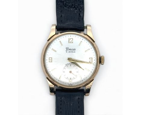 A Timor gents 9ct gold manual wind watch, with round silver dial signed '21 jewels, Incabloc', Arabic twelve, three, six and 