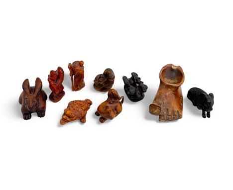 Seven Japanese hardwood carved Netsuke figures / animals to include; Jin Chan, Cat &amp; Rat, Bunny, Fisherman, Elephant &amp
