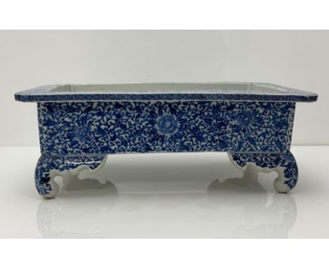 A Chinese blue & white bonsai planter, 38 x 26 cm, height 14cm.There is a crack running through one side and a large chip int