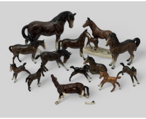 Beswick collection of Horses and foals (12), plus one other model of horse and foal. One has a broken leg and the largest fig