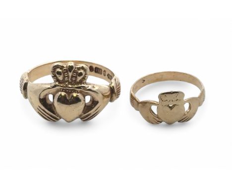Two hallmarked 9ct gold Claddagh . Larger ring size T, smaller ring size K.. Gross weight 7.45g