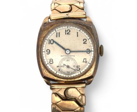 A vintage 9ct gold gents watch on a stainless steel Excalibur bracelet. Dennison case with Birmingham hallmarks, numbered 111