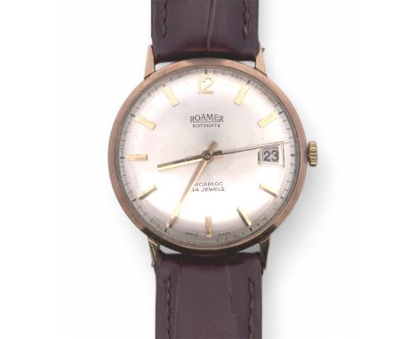 An automatic Roamer Rotodate 44 jewel gents 9ct gold watch. Dial with gold toned baton markers and date display,  on brown le