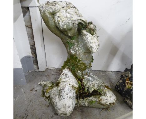 A weathered concrete garden statue, nude study of a woman. Height 51cm. 