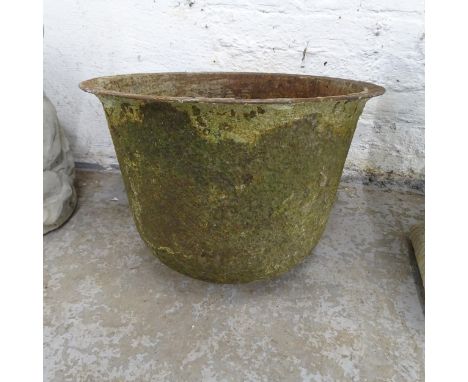 A weathered metal circular garden planter with rounded base. 48x39cm 