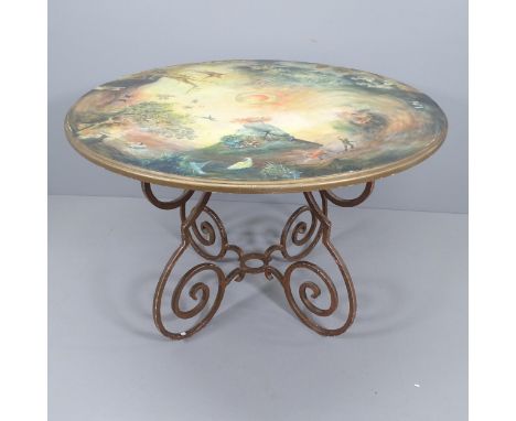 A late 20th century painted table on wrought iron base, in the Hollywood Regency manner, the top finely painted with scenes f