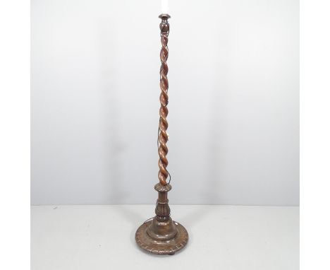 A vintage standard lamp with mahogany barley twist column.  156cm. 