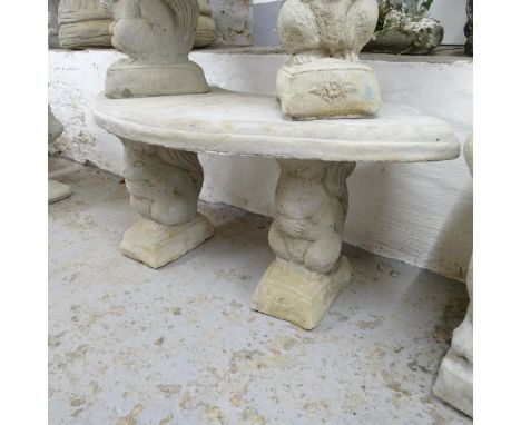 A three-section concrete curved garden bench on squirrel design plinths. 105x44x44cm 