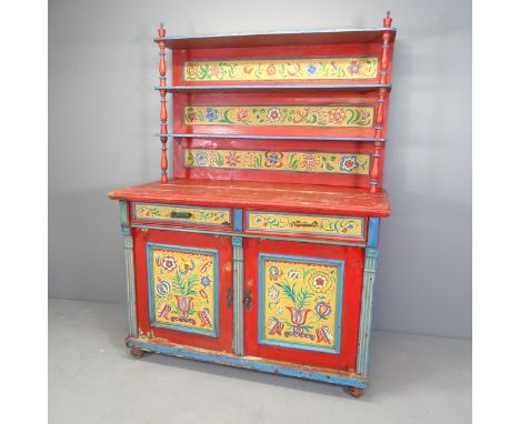 An antique Folk Art painted two section dresser, with shelved top, two frieze drawers and cupboards under. 137x185x68cm. 