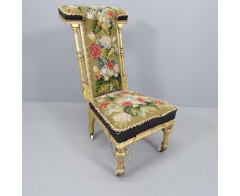 A 19th century giltwood French prayer chair with tapestry upholstery, height 90cmOriginal tapestry is worn, frayed at fringes