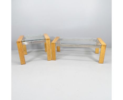 A modern glass top coffee table with light oak and chrome frame (120x45x60cm) and matching side table (70x55x61cm). (2). 