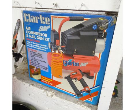 A Clarke model ZX5600 air compressor in original box. 