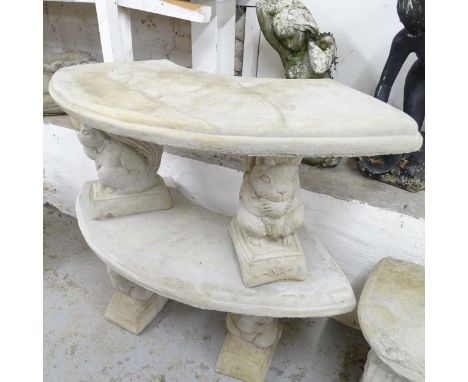 A three-section curved garden bench on squirrel design plinths. 102x44x48cm 